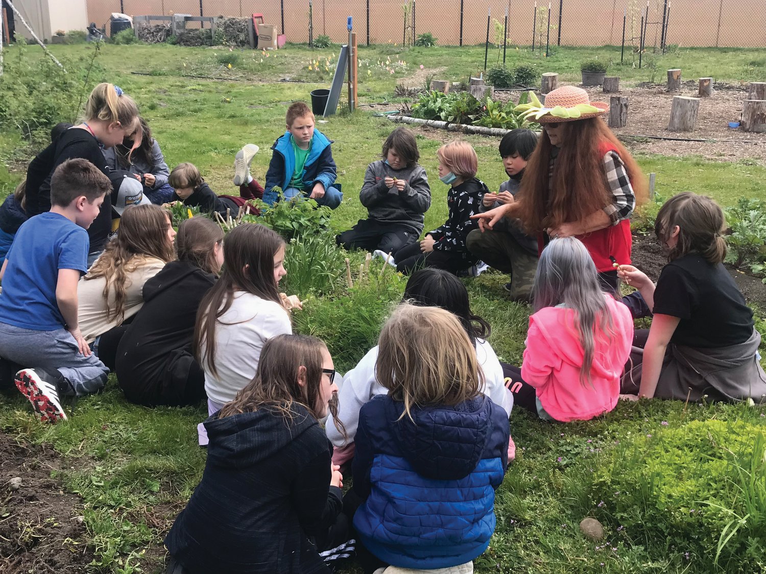 Students learn about culinary and medicinal herbs with guest herbalist Shatoiya De La Tour. Photo courtesy of Chimacum Elementary School.